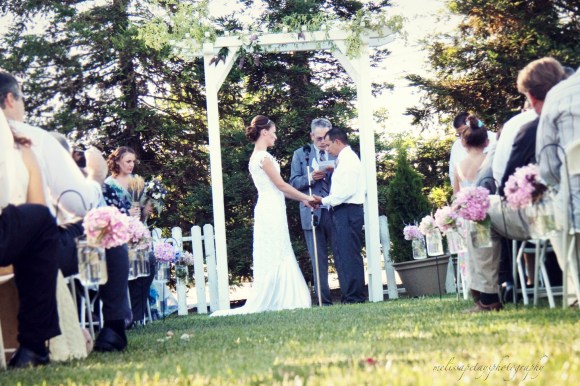 'wedding under arch'