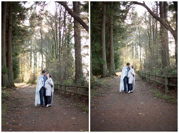 "Couple wrapped in blanket image"