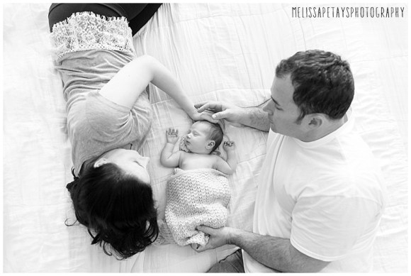 "parents and new baby image"